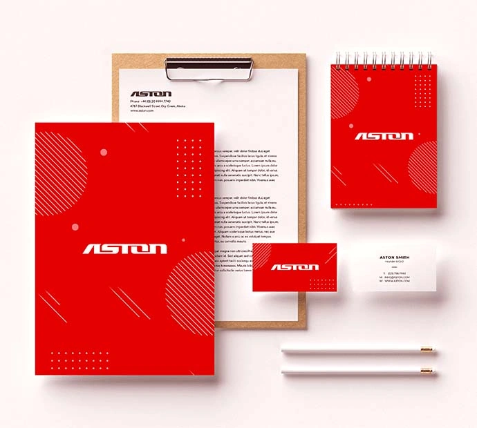 Red stationery set featuring a clipboard and pen for design.